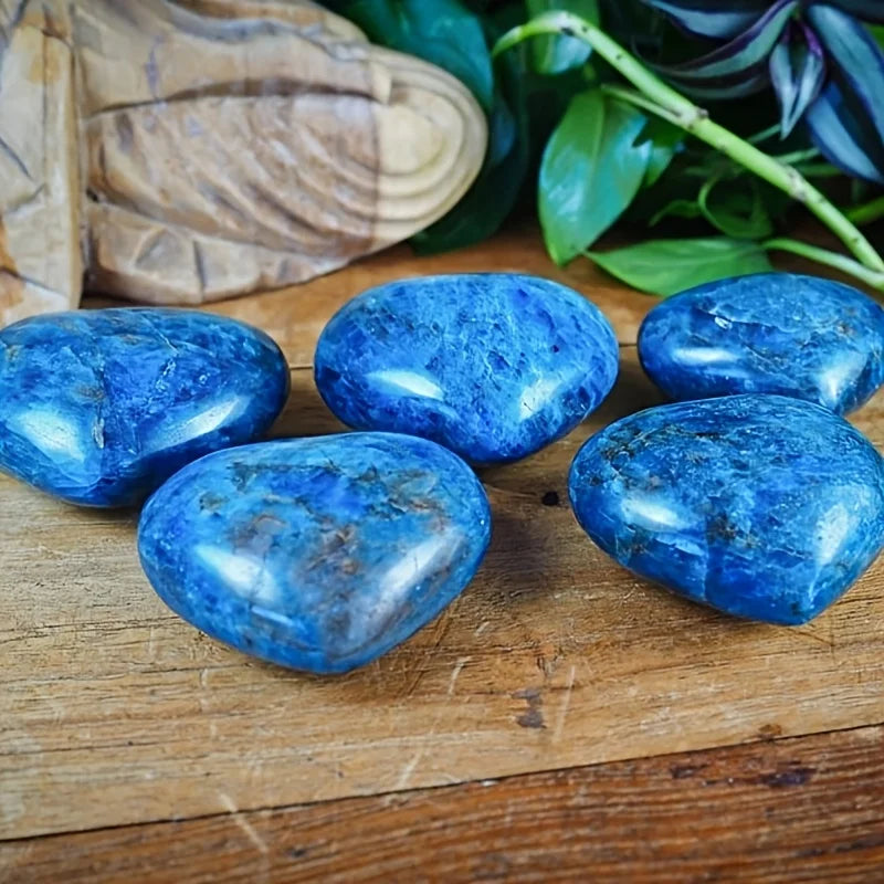 A cute blue apatite heart, a blue apatite heart-shaped palm stone.