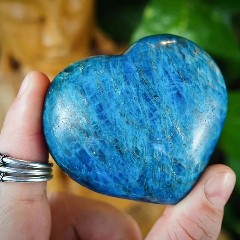 A cute blue apatite heart, a blue apatite heart-shaped palm stone.