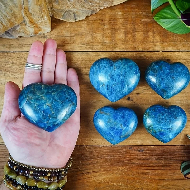 A cute blue apatite heart, a blue apatite heart-shaped palm stone.
