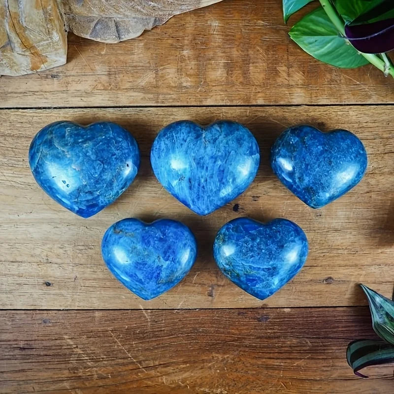 A cute blue apatite heart, a blue apatite heart-shaped palm stone.